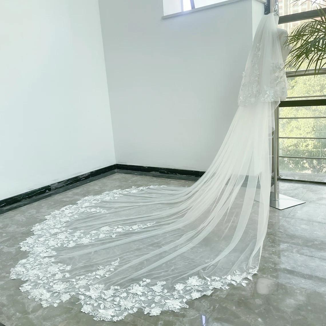 Long white wedding veil with floral lace
