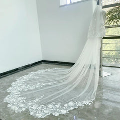 Long white wedding veil with floral lace