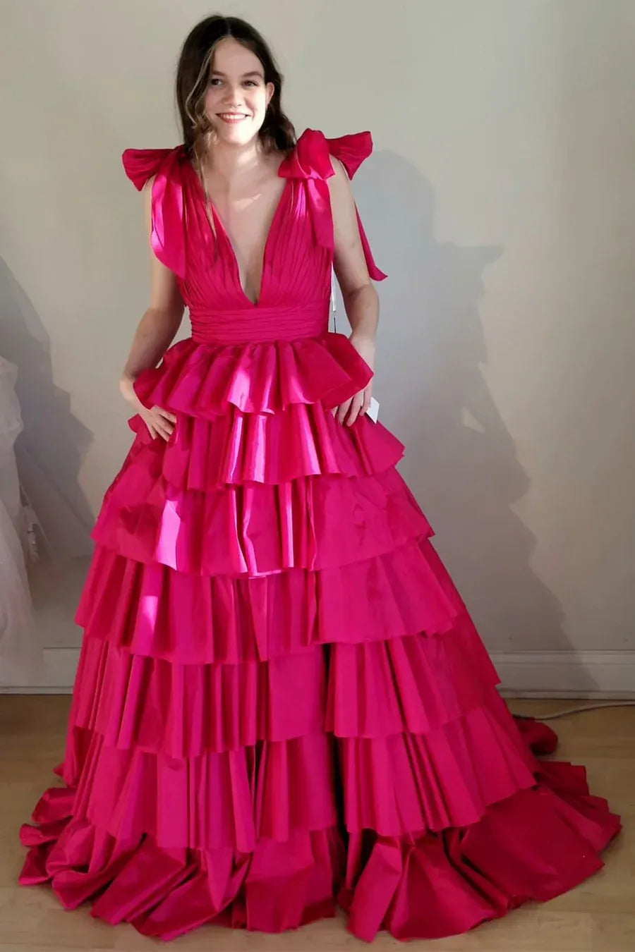 pink prom dress with ruffled layers 