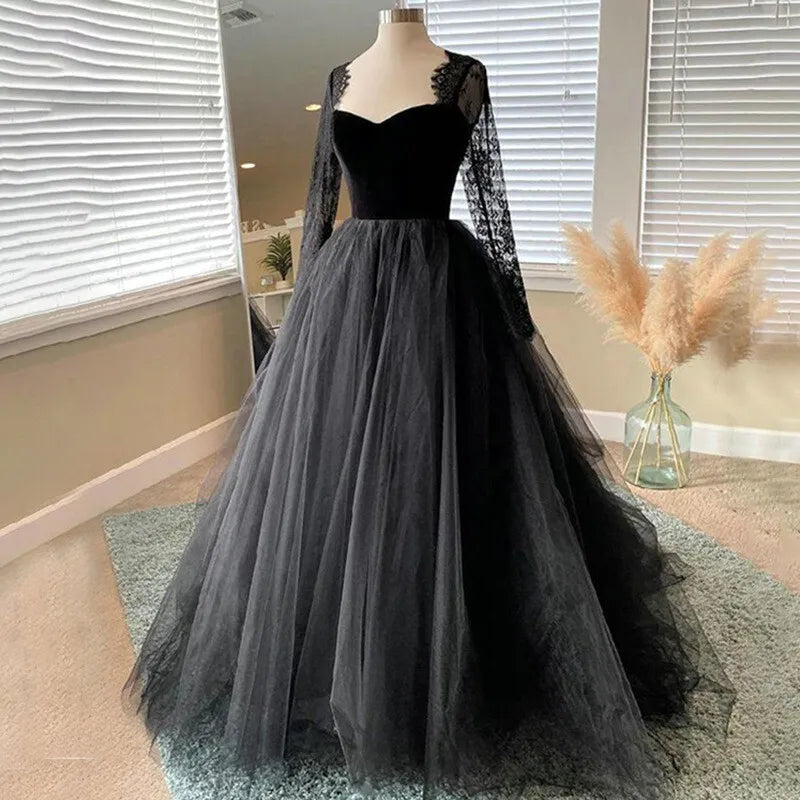 Black evening gown with sheer sleeves