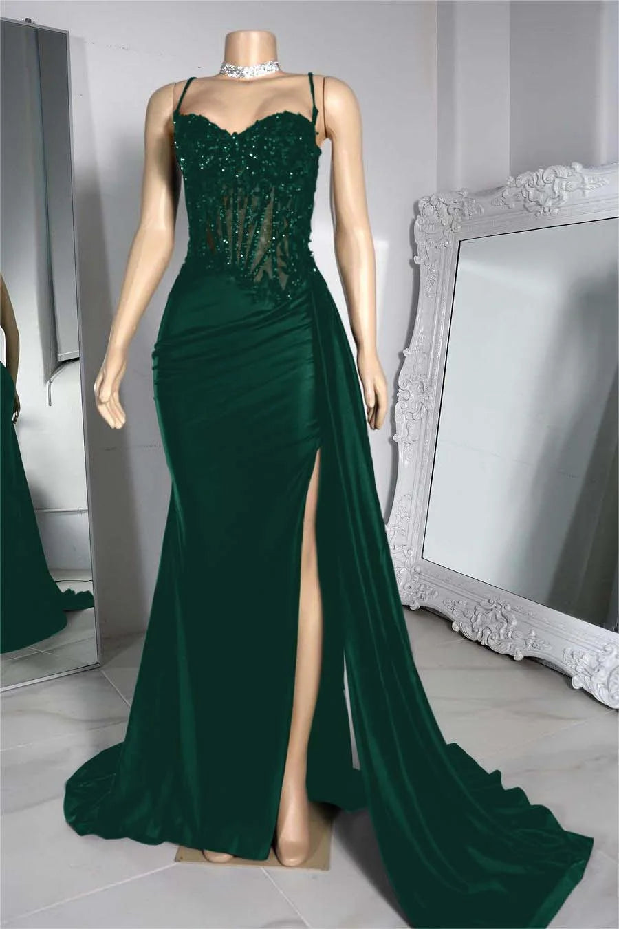 Green evening gown with a high slit