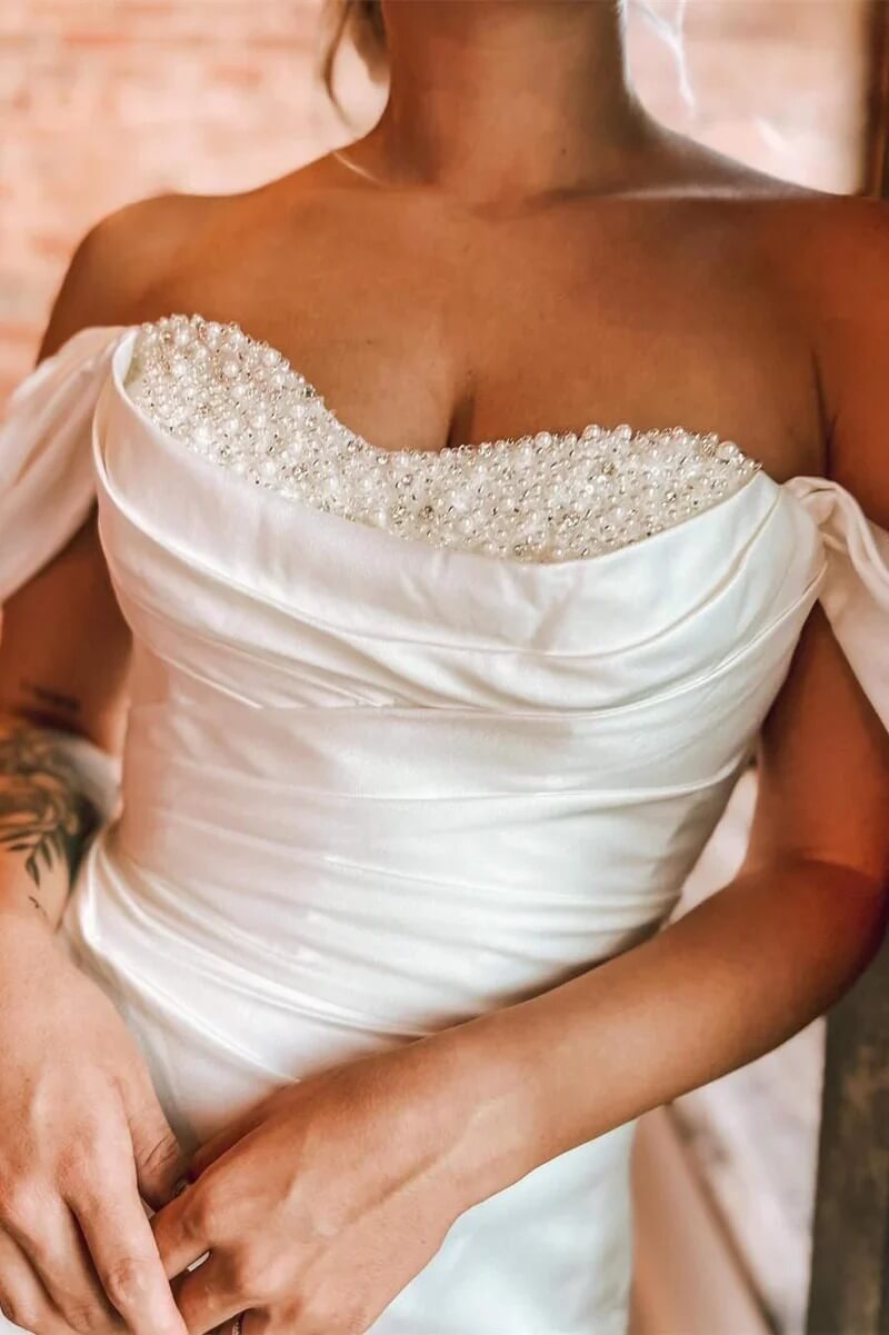 White strapless wedding dress with beaded neckline