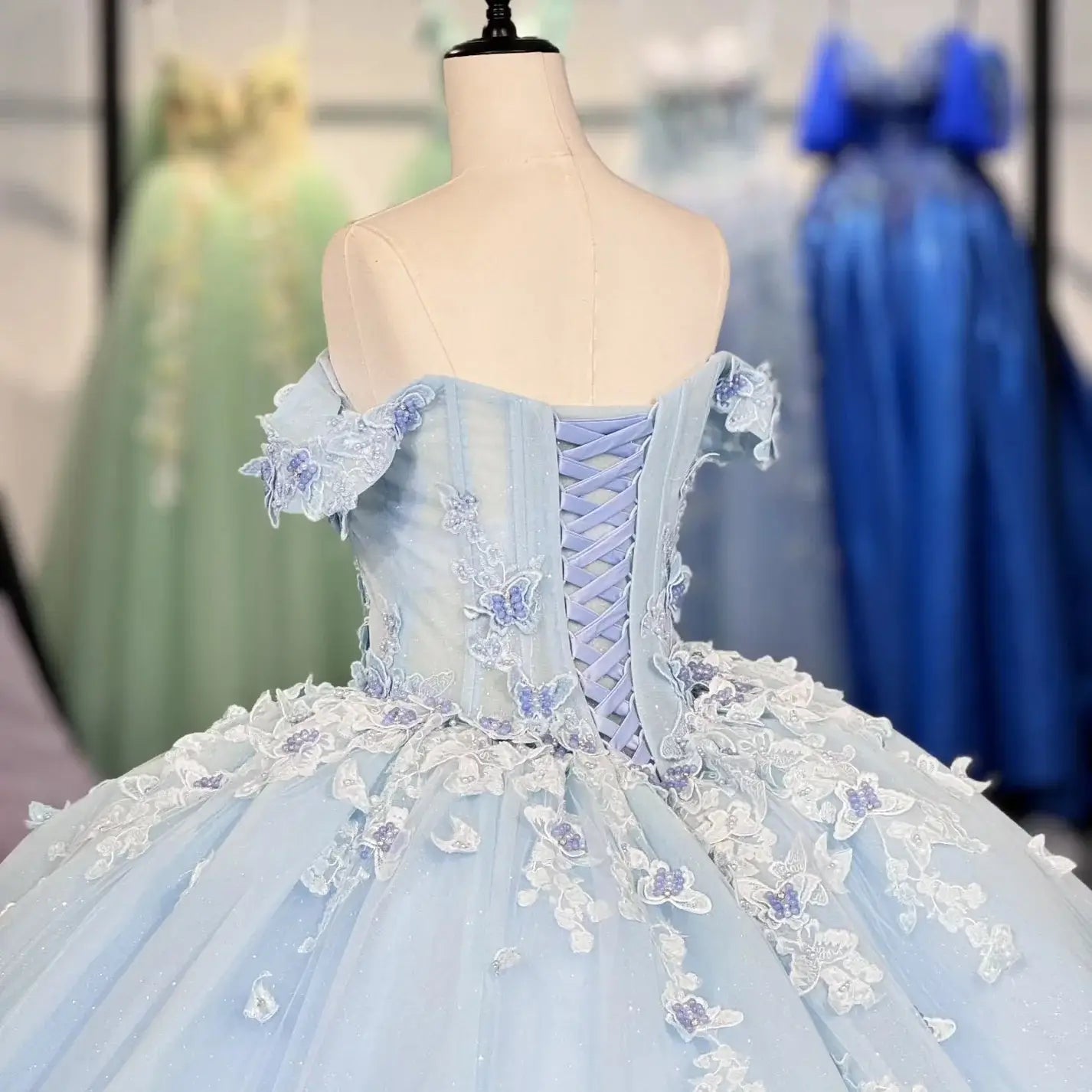 Light blue evening gown with floral details