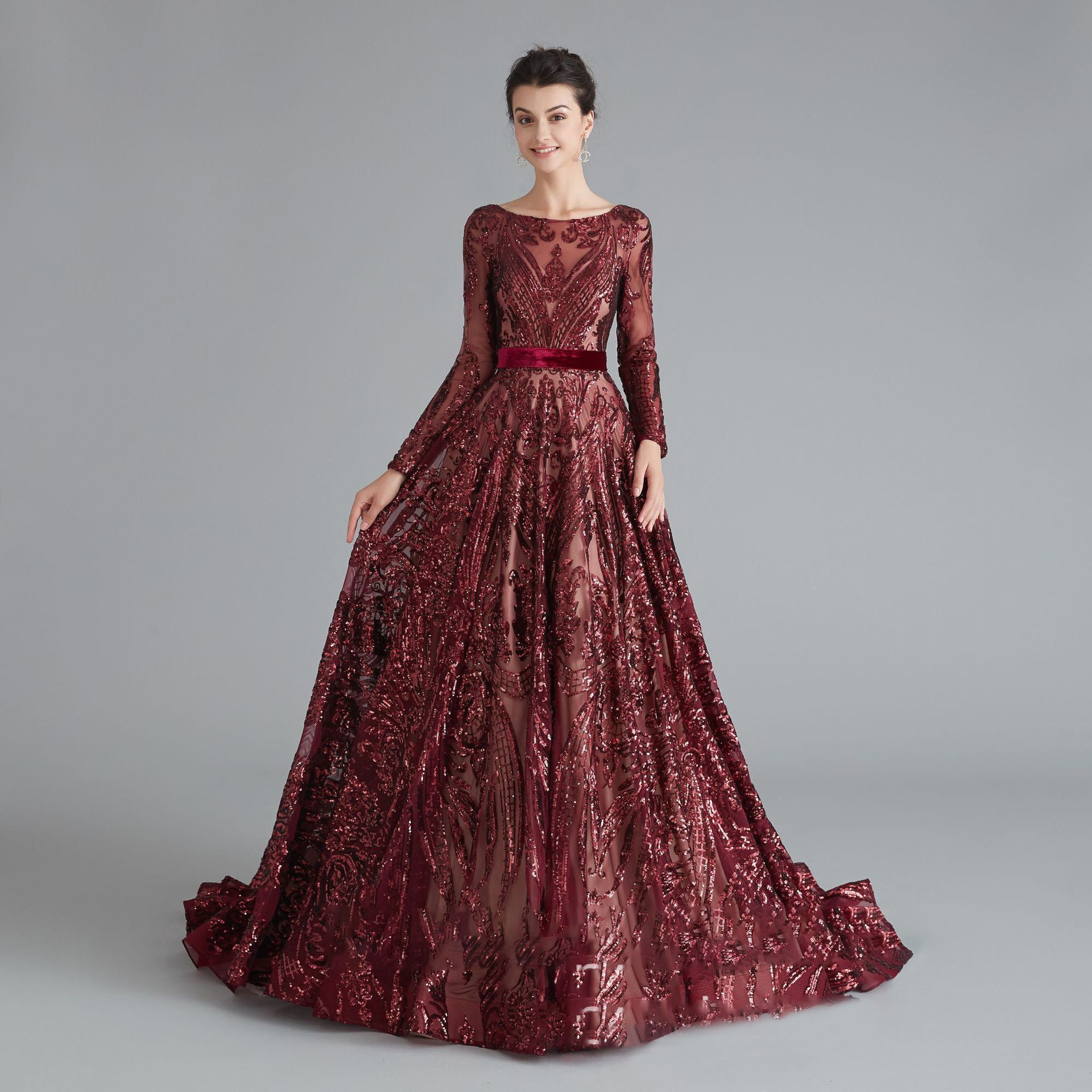 burgundy evening gown with long sleeves