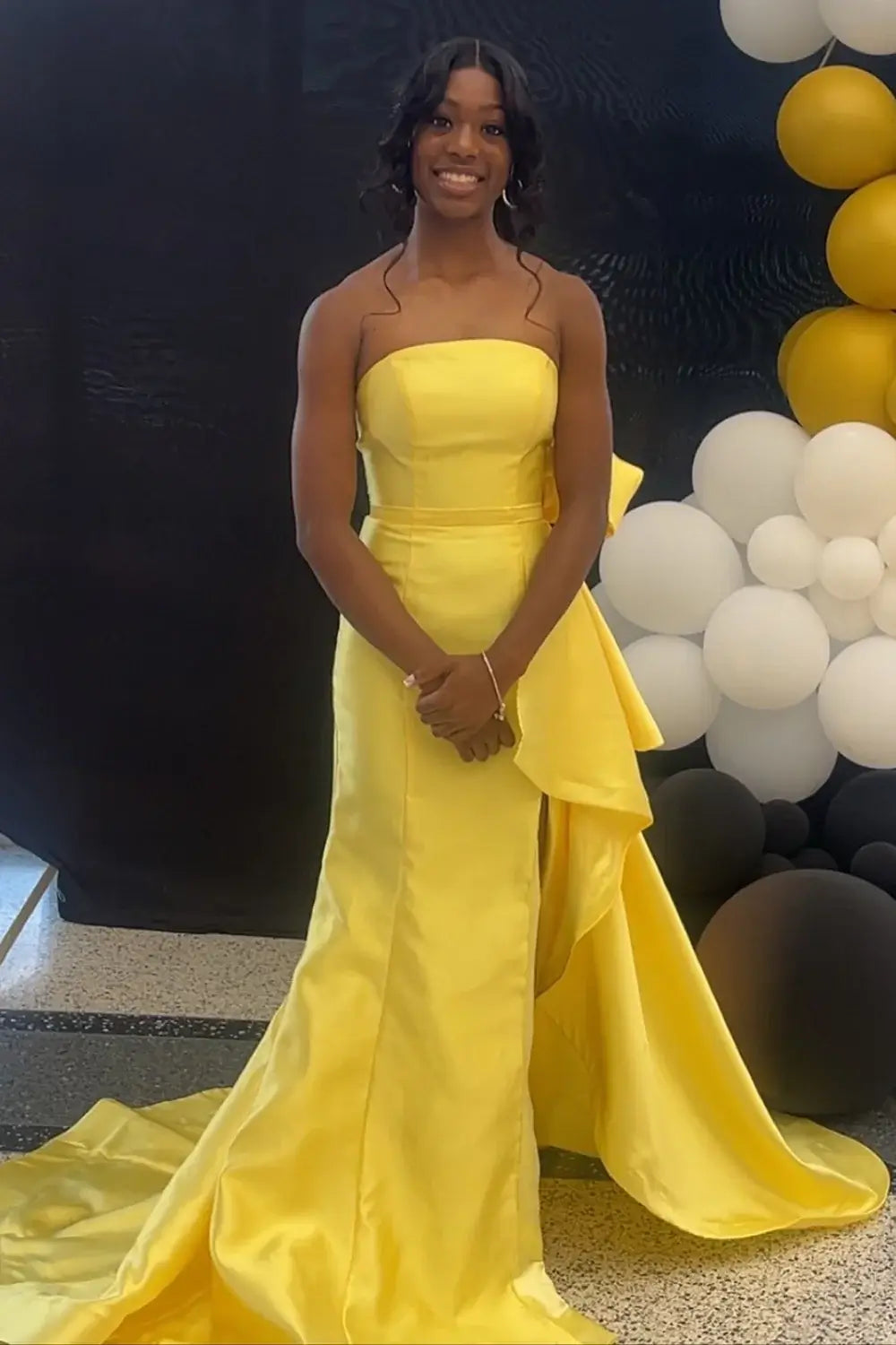 yellow strapless evening gown